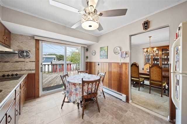 17 Damin Dr S, Farmingdale, NY 11735 - dining room with baseboard heating, a chandelier, ornamental molding, a wainscoted wall, and a ceiling fan
