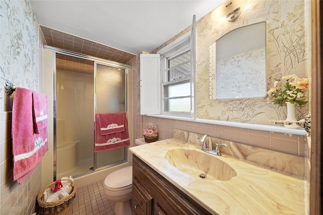 17 Damin Dr S, Farmingdale, NY 11735 - bathroom featuring wallpapered walls, tile walls, vanity, a shower with door, and tile patterned flooring