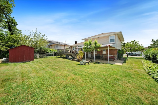17 Damin Dr S, Farmingdale, NY 11735 - fenced backyard with a patio area, a shed, a wooden deck, and stairway