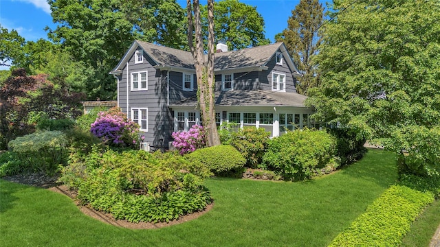 3 Turnip Hl, Northport, NY 11768 - back of house featuring a lawn and a chimney