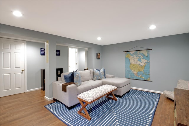 30 Prescott St, Garden City, NY 11530 - living area with light wood-style floors and recessed lighting
