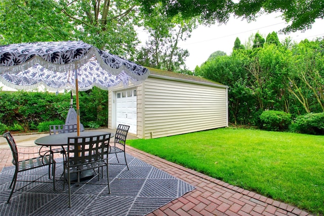 30 Prescott St, Garden City, NY 11530 - view of patio featuring outdoor dining space and an outbuilding