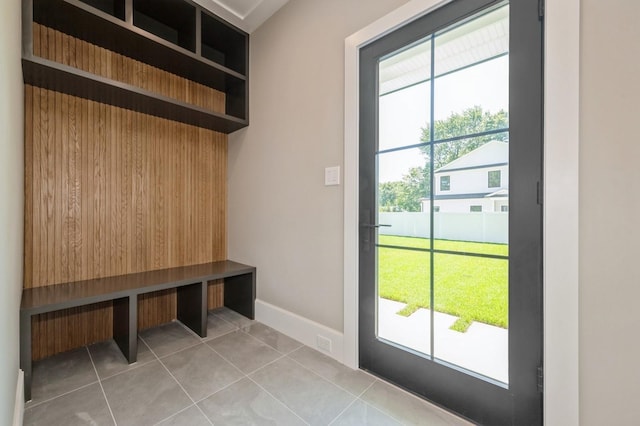 352 Cold Spring Rd, Syosset, NY 11791 - mudroom featuring plenty of natural light and light tile patterned flooring