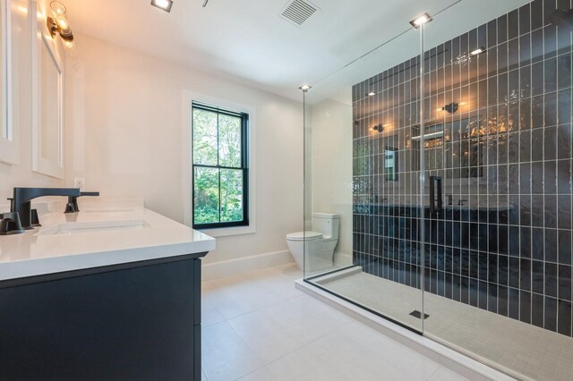 352 Cold Spring Rd, Syosset, NY 11791 - bathroom with a stall shower, double vanity, and tile patterned floors