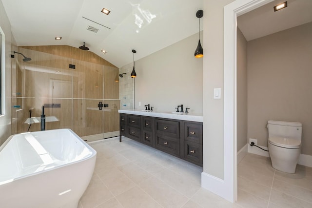 352 Cold Spring Rd, Syosset, NY 11791 - bathroom with tile patterned flooring, vaulted ceiling, a stall shower, a soaking tub, and double vanity