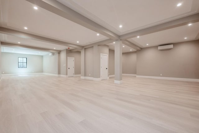 352 Cold Spring Rd, Syosset, NY 11791 - basement featuring a wall unit AC, light wood-style flooring, and recessed lighting