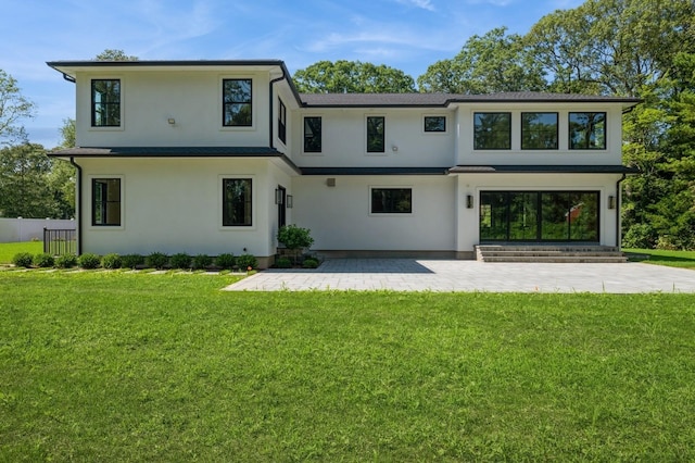 352 Cold Spring Rd, Syosset, NY 11791 - rear view of property featuring stucco siding and a patio area