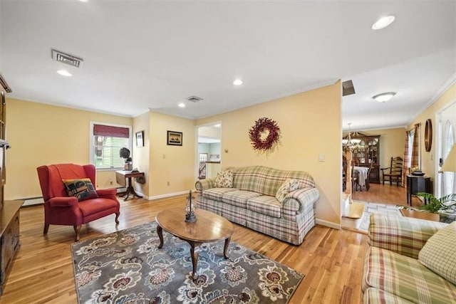 1 Cindy Ln, Highland Mills, NY 10930 - living area featuring crown molding, light wood-style floors, recessed lighting, and a baseboard radiator