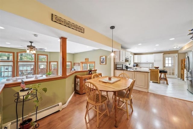 1 Cindy Ln, Highland Mills, NY 10930 - dining space featuring baseboard heating, ceiling fan, recessed lighting, light wood-style flooring, and decorative columns
