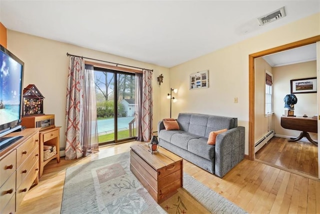 1 Cindy Ln, Highland Mills, NY 10930 - living area with light wood finished floors and baseboard heating