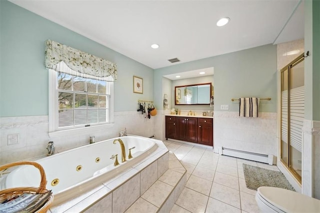 1 Cindy Ln, Highland Mills, NY 10930 - bathroom featuring a baseboard radiator, vanity, a jetted tub, a stall shower, and tile patterned floors
