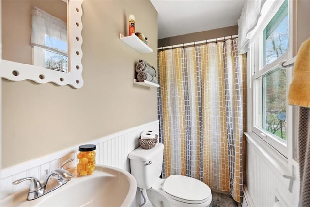 1 Cindy Ln, Highland Mills, NY 10930 - bathroom featuring wainscoting, a decorative wall, and a shower with shower curtain