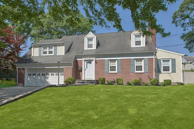 19 Cloverdale Ave, White Plains, NY 10603 - view of front facade featuring brick siding, asphalt driveway, a chimney, and a shingled roof