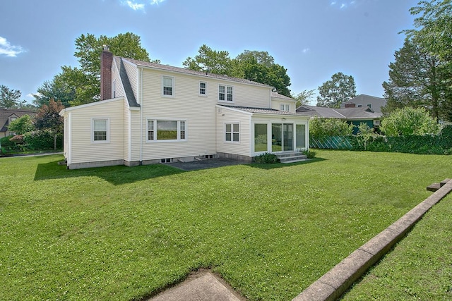 19 Cloverdale Ave, White Plains, NY 10603 - back of property with a chimney, entry steps, and a yard