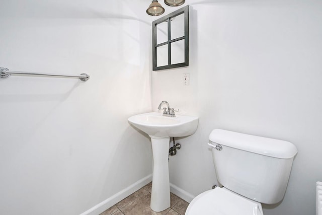 19 Cloverdale Ave, White Plains, NY 10603 - bathroom with toilet and tile patterned floors