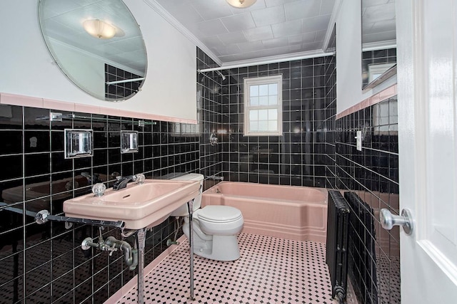 19 Cloverdale Ave, White Plains, NY 10603 - bathroom featuring tile walls, crown molding, washtub / shower combination, and tile patterned floors