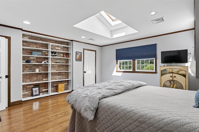 353 Split Rock Rd, Syosset, NY 11791 - bedroom featuring a skylight, ornamental molding, wood finished floors, and recessed lighting