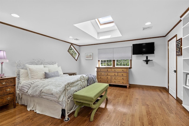 353 Split Rock Rd, Syosset, NY 11791 - bedroom featuring a skylight, crown molding, wood finished floors, and recessed lighting