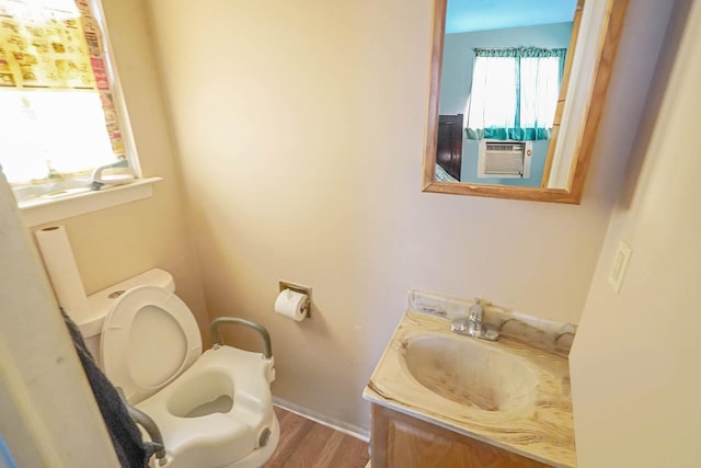 138 Fairview Ave, Deer Park, NY 11729 - bathroom featuring vanity, wood finished floors, and cooling unit