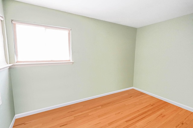 138 Fairview Ave, Deer Park, NY 11729 - spare room with wood finished floors and baseboards