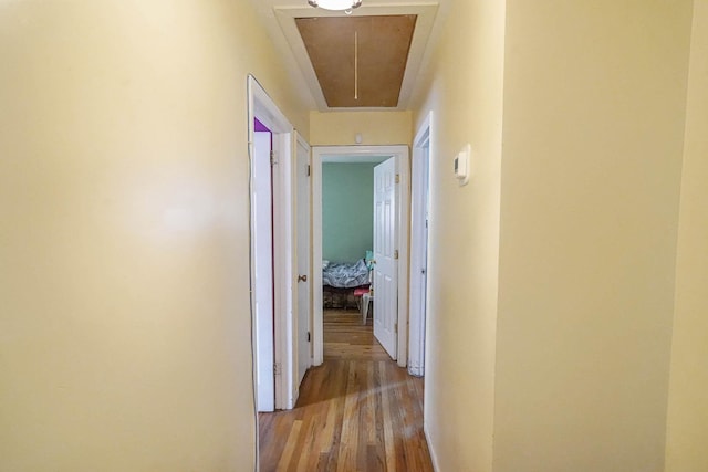 138 Fairview Ave, Deer Park, NY 11729 - corridor with attic access and light wood-style flooring
