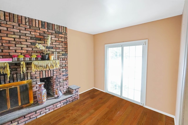 138 Fairview Ave, Deer Park, NY 11729 - unfurnished living room featuring a fireplace and wood finished floors