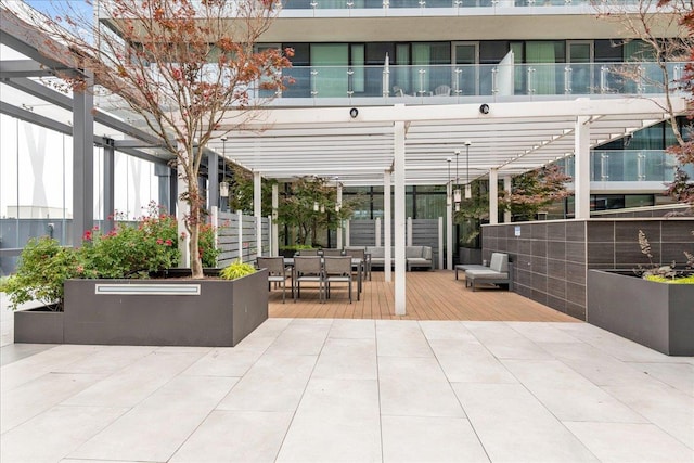 131-05 40th Rd Unit 15G, Flushing, NY 11354 - view of patio / terrace with a pergola, outdoor dining area, and a deck