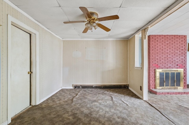 106 Montgomery Ave, Staten Island, NY 10301 - unfurnished room with carpet flooring, a ceiling fan, crown molding, and a fireplace