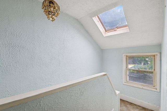 106 Montgomery Ave, Staten Island, NY 10301 - detailed view of a skylight, a textured wall, and carpet floors