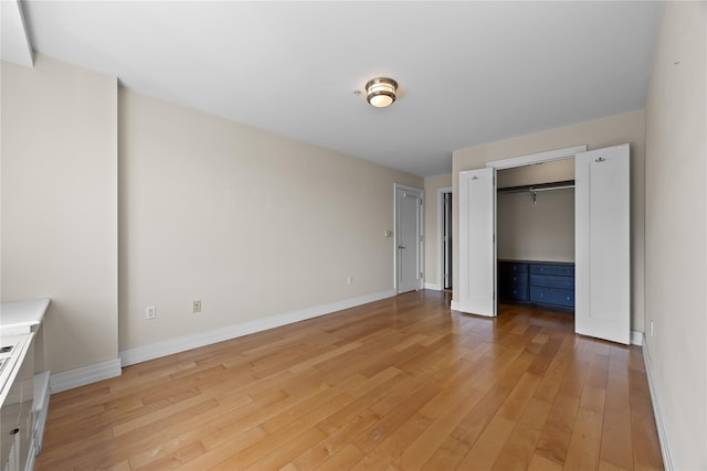 64-05 Yellowstone Blvd Unit 316S, Forest Hills, NY 11375 - unfurnished bedroom featuring light wood-style flooring and a closet