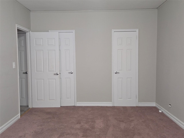 55 E 190th St Unit 45, Bronx, NY 10468 - unfurnished bedroom with carpet and baseboards