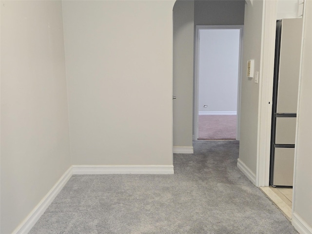 55 E 190th St Unit 45, Bronx, NY 10468 - unfurnished room featuring light colored carpet and arched walkways