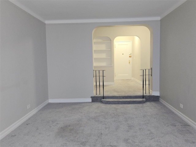 55 E 190th St Unit 45, Bronx, NY 10468 - carpeted spare room with arched walkways and baseboards