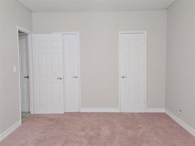 55 E 190th St Unit 45, Bronx, NY 10468 - unfurnished bedroom with carpet floors and baseboards