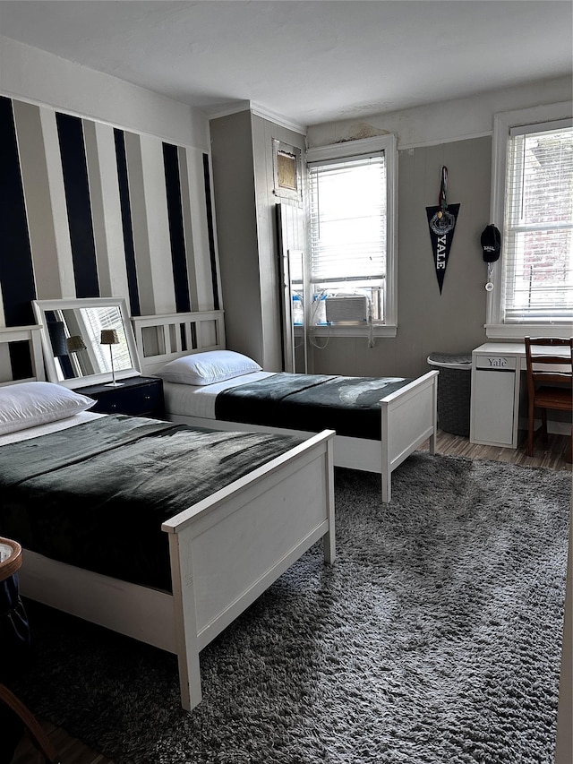 1836 Matthews Ave, Bronx, NY 10461 - bedroom featuring stainless steel fridge, cooling unit, and wood finished floors