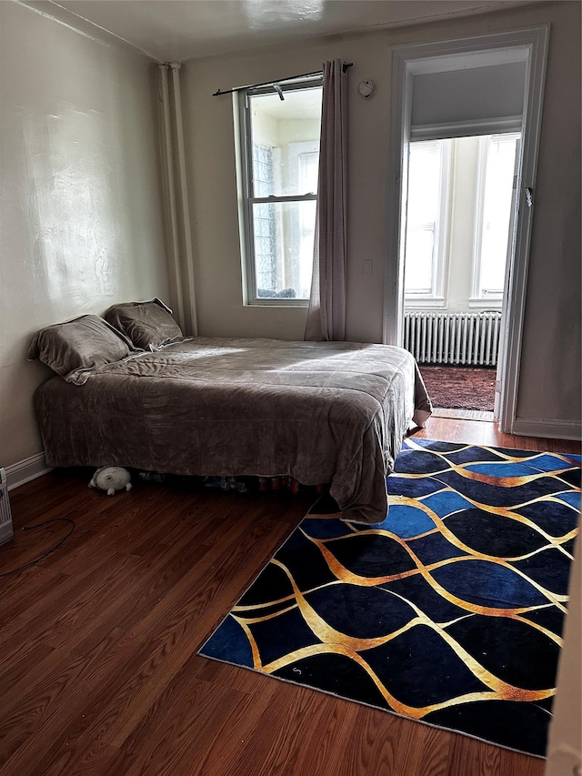 1836 Matthews Ave, Bronx, NY 10461 - bedroom featuring radiator and wood finished floors