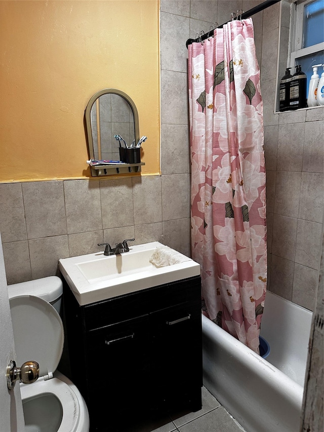 1836 Matthews Ave, Bronx, NY 10461 - full bathroom featuring tile walls, shower / bath combination with curtain, vanity, and tile patterned flooring