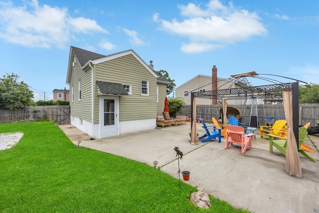 331 44th St, Lindenhurst, NY 11757 - back of property featuring a gazebo, a patio, and a fenced backyard