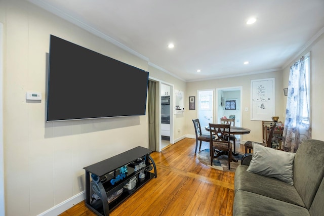331 44th St, Lindenhurst, NY 11757 - living area featuring crown molding, hardwood / wood-style floors, plenty of natural light, and recessed lighting