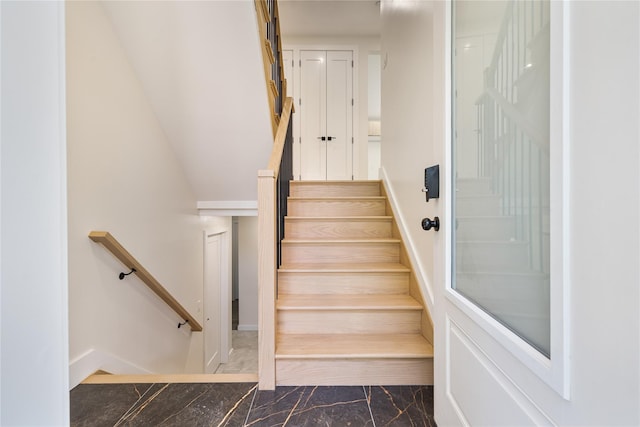 3 Jay St Unit 214, Spring Valley, NY 10977 - stairs with marble look tiles and baseboards
