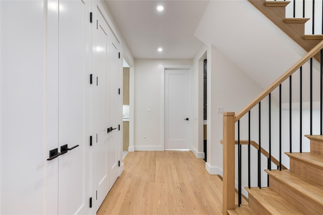 3 Jay St Unit 214, Spring Valley, NY 10977 - hallway featuring light wood-type flooring, recessed lighting, and stairway