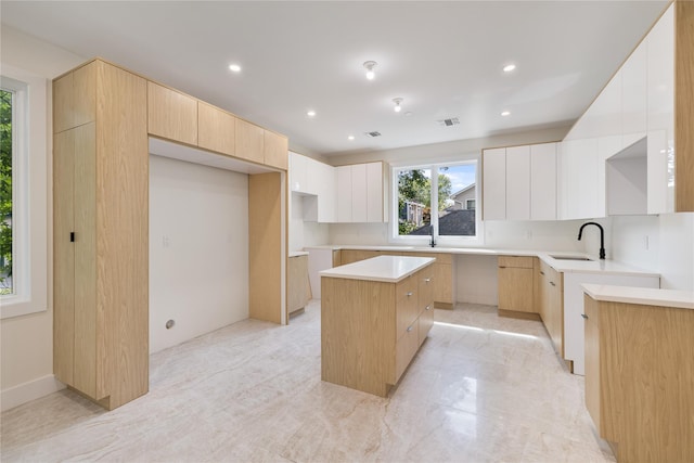 3 Jay St Unit 214, Spring Valley, NY 10977 - kitchen featuring modern cabinets, a kitchen island, recessed lighting, and light brown cabinetry