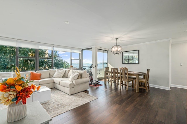 166-41 Powells Cove Blvd Unit 4B, Beechhurst, NY 11357 - living room with a chandelier, dark wood-type flooring, crown molding, and a water view