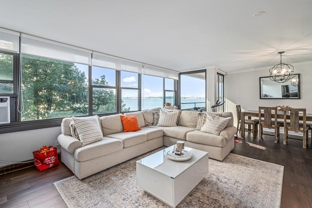 166-41 Powells Cove Blvd Unit 4B, Beechhurst, NY 11357 - living area featuring hardwood / wood-style floors, plenty of natural light, ornamental molding, a water view, and a chandelier