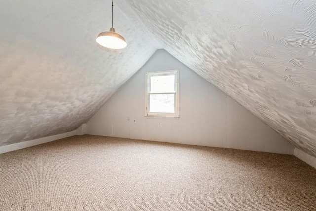 404 Foxdale Ave, Oceanside, NY 11572 - additional living space with vaulted ceiling and carpet