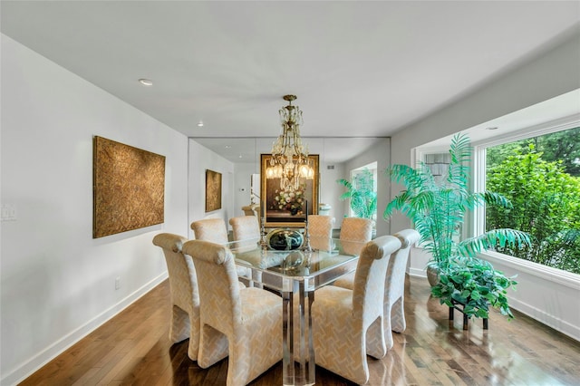 74 Woods Dr, Roslyn, NY 11576 - dining space featuring hardwood / wood-style flooring, a chandelier, and recessed lighting