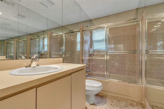 74 Woods Dr, Roslyn, NY 11576 - bathroom featuring vanity, shower / bath combination with glass door, and tile patterned flooring