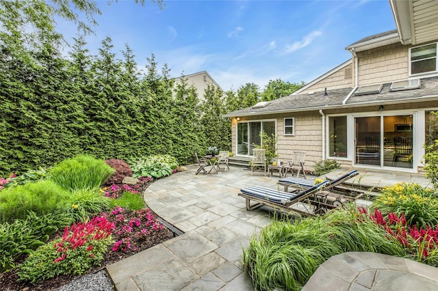 74 Woods Dr, Roslyn, NY 11576 - view of patio featuring outdoor dining area