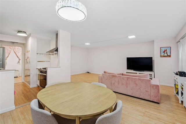102-30 66th Rd Unit 1G, Forest Hills, NY 11375 - dining space featuring light wood finished floors and baseboards