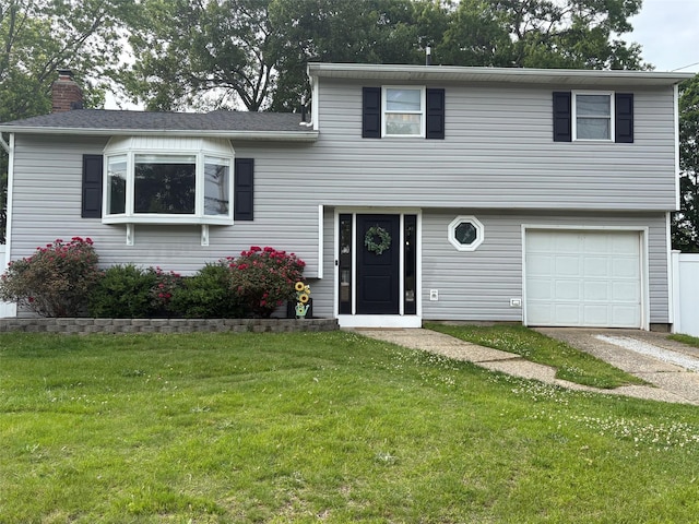 93 Holiday Park Dr, Centereach, NY 11720 - split level home with a garage, driveway, a front yard, and a chimney